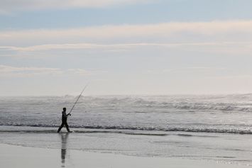 un pecheur et la mer