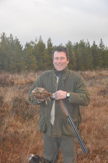chasseur fier d'avoir chassé