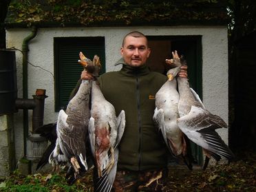 chasseurs avec des oies